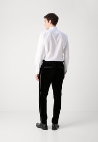 HUGO GETLIN - Suit trousers - black