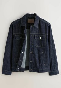 Mørk denimjakke med knaplukning fortil, to brystlommer, sidelommer og kontrasterende gul syning. Har en lige pasform og krave.