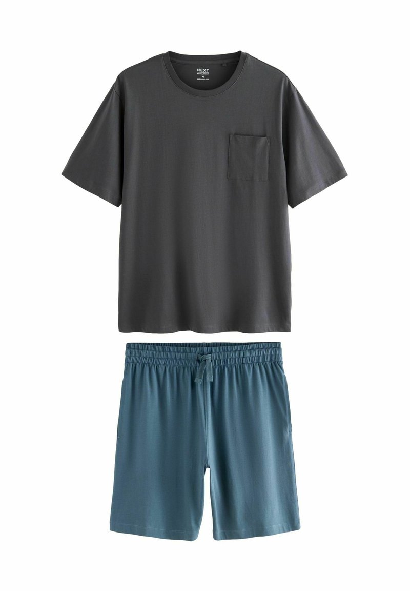 Gray cotton t-shirt with a chest pocket, paired with blue shorts featuring an elastic waistband and drawstring. Soft, smooth fabric.