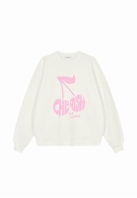 Sweatshirt couleur crème avec un design graphique rose de talons hauts et de cerises, accompagné du texte "CHÉRIR le moment", col rond et coupe ample.