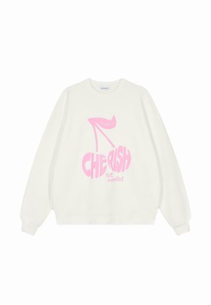 Cremefarvet sweatshirt med et pinkt grafisk design af højhælede sko og kirsebær samt teksten "CHERISH the moment," rund halsudskæring og løs pasform.