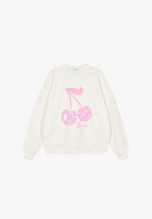 Krém színű pulóver, amelyen egy rózsaszín grafikai design látható, ami magas sarkú cipőket és cseresznyét ábrázol, a "CHERISH the moment" felirattal, kerek nyakkivágású és laza fazonnal.