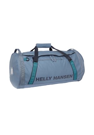 Hellblauer zylindrischer Sporttasche mit türkisfarbenen und schwarzen Griffen, einem Reißverschluss am Hauptfach und dem "HELLY HANSEN"-Logo an der Seite.