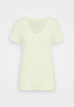 Lichtgele dames T-shirt van katoen met korte mouwen en V-hals, aansluitende pasvorm, afgebeeld op een effen witte achtergrond.
