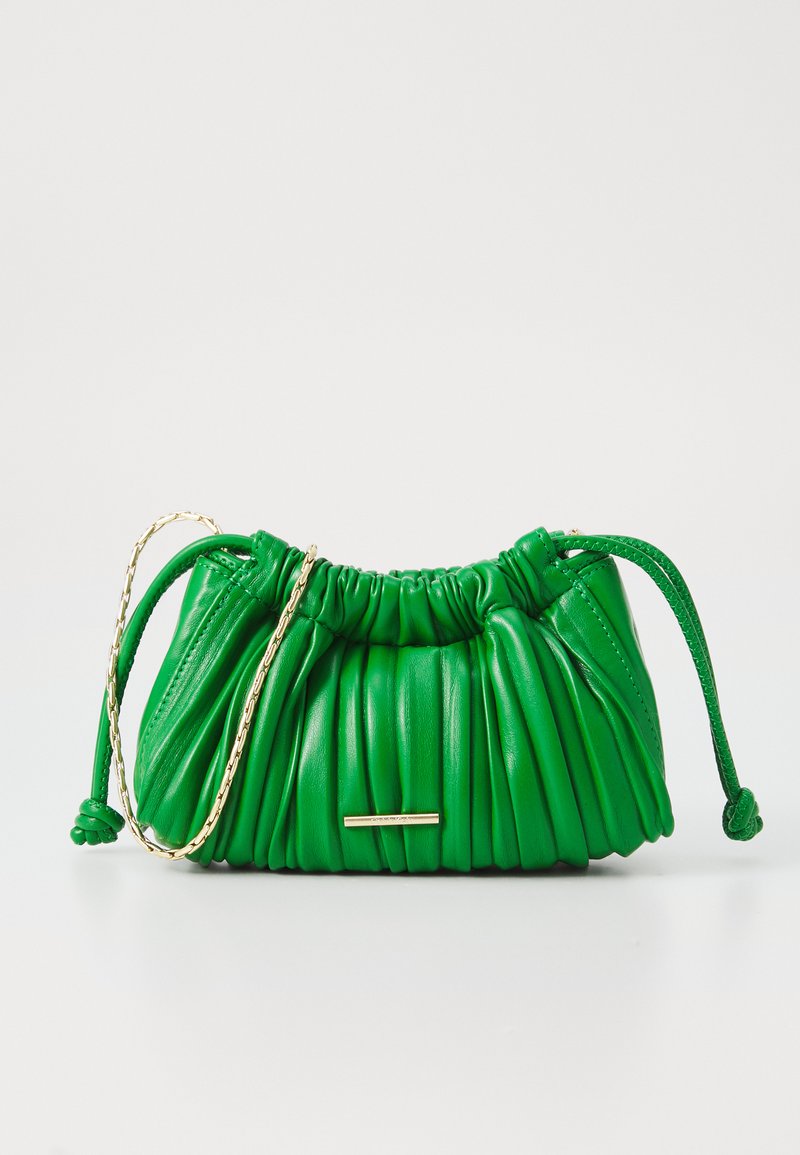 Green leather handbag with gathered texture, gold chain detail, and drawstring closure. Features a minimalistic gold hardware accent.