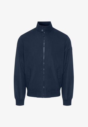 Veste bomber bleu marine en tissu léger. Dotée d'un col haut, d'une fermeture éclair à l'avant, de poches latérales et de poignets et d'un ourlet côtelés.