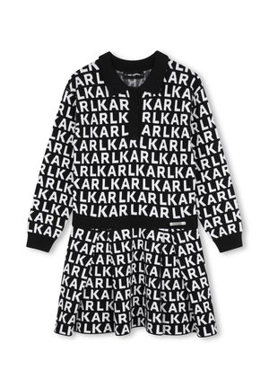 Robe noire et blanche à manches longues avec col, avec motif de texte répétée "KARL" et jupe plissée.
