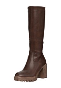 Stivale in pelle marrone alto fino al ginocchio con tacco chunky, suola testurizzata e finitura liscia. Caratterizzato da un design aderente e dettagli di cucitura minimi.