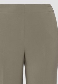 Grüne, dehnbare Hosen mit einer glatten Textur und einer taillierten Passform. Besitzt einen breiten Bund und keine sichtbaren Taschen oder Beschläge.