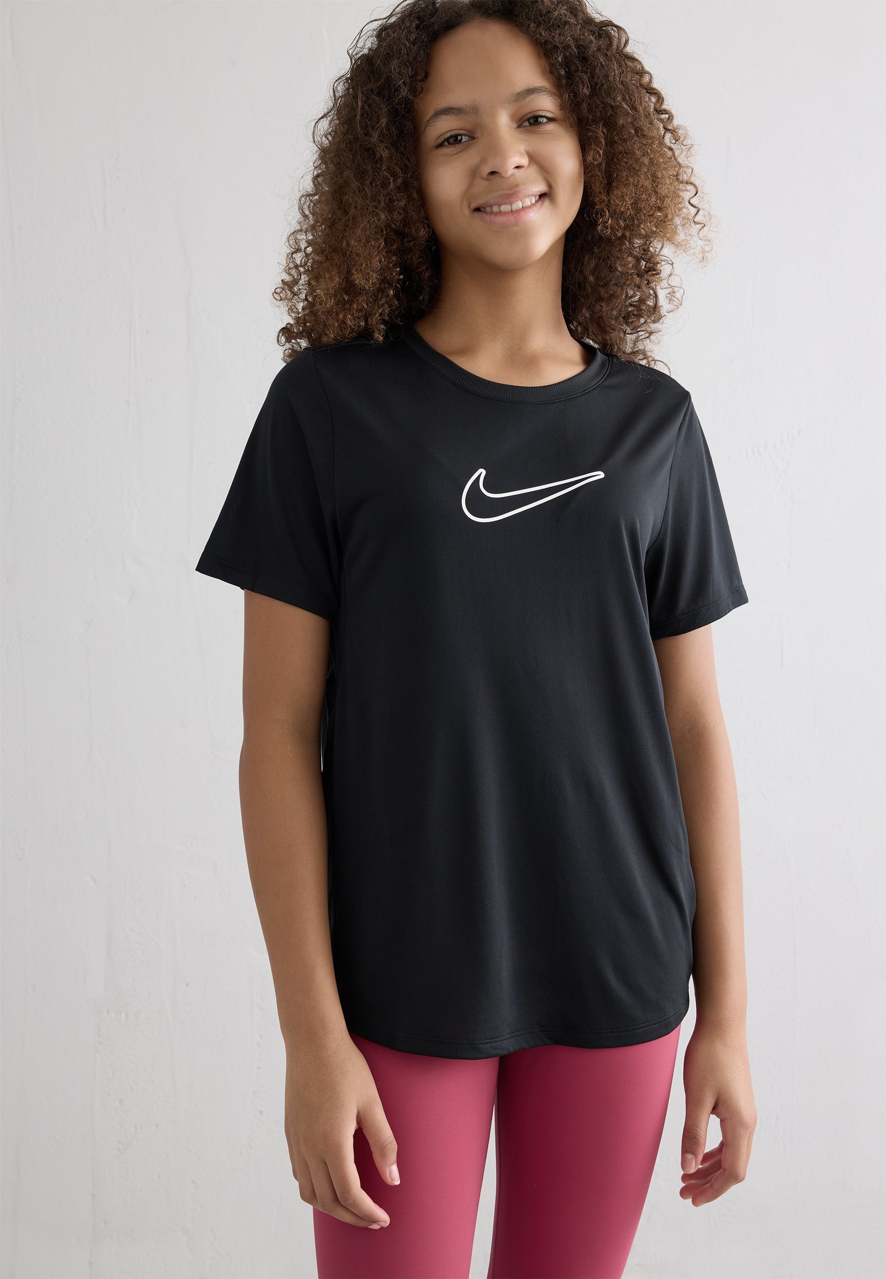 black nike shirt with pink swoosh