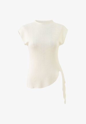 Haut en maille sans manches couleur crème avec col montant et ourlet asymétrique comportant un long lien en tissu d’un côté.