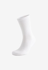 Calzino bianco in cotone con texture a coste, di lunghezza media fino al polpaccio, con punta e tallone rinforzati. Superficie liscia, senza motivi o accenti.