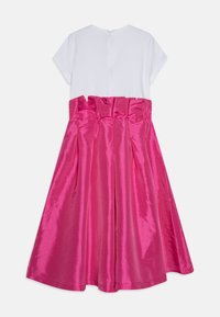 White top with short sleeves, center back zipper, paired with a pink satin skirt that has a ruched waistband and pleated design.