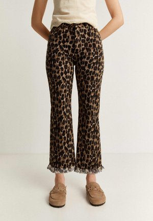 Scalpers LEO PRINT - Pantaloni - animal print