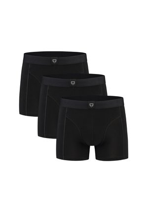Drie zwarte boxershorts voor heren met een klein wit logo op de voorste middelste tailleband, gerangschikt in een verspringende rij op een witte achtergrond.