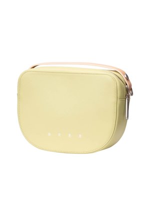 Pale yellow rectangular crossbody bag with rounded edges, beige strap, silver zipper, and small white lettering on front center.