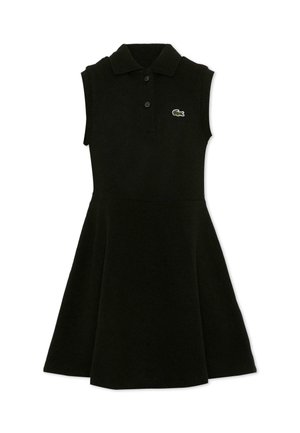 Zwarte mouwloze polojurk met uitlopende rok en twee knopen aan de sluiting, met een klein groen krokodillenlogo op de borst.