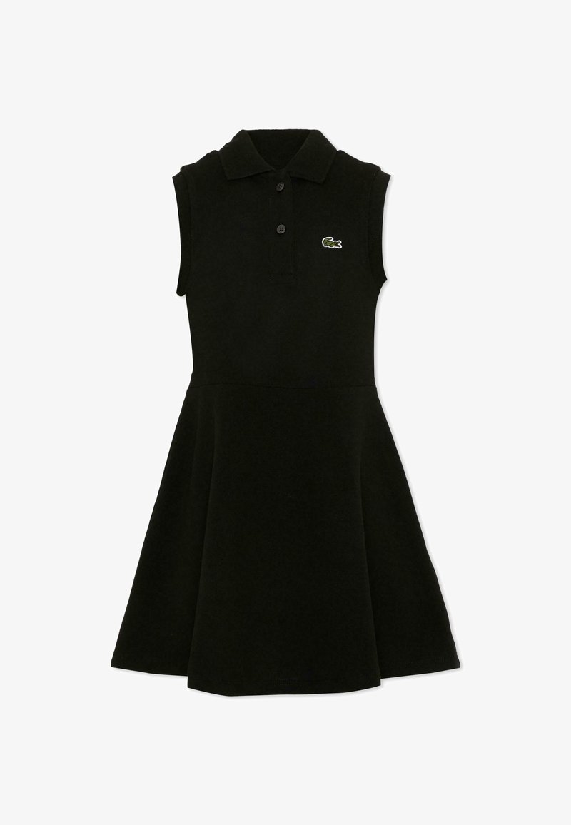 Abito polo nero senza maniche con gonna svasata e patta con due bottoni, con piccolo logo di coccodrillo verde sul petto.