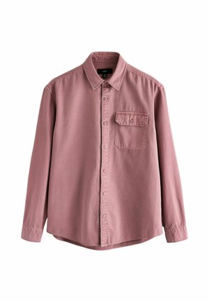 Langærmet skjorte i støvet rosa, lavet af bomuld. Har en button-down krave, brystlomme og knaplukning. Blød, ensfarvet tekstur.