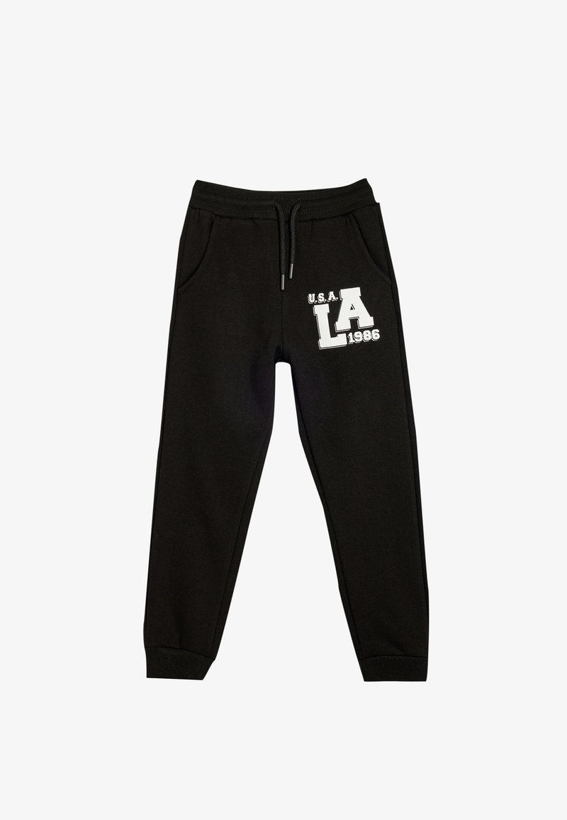 Zwarte joggingbroek met elastische tailleband en trekkoord. Bevat zijzakken en een witte grafische print met de tekst "U.S.A. LA 1986." Zacht van textuur.