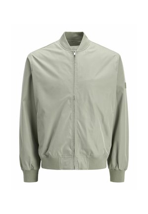 Veste bomber vert clair en tissu lisse. Dotée d'une fermeture éclair, d'un col et de poignets côtelés, et d'une coupe décontractée.