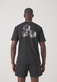 Nike Performance HYVERSE TOP - Sports T-shirt - black