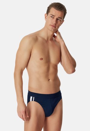 Marineblauwe herenonderbroek met een zachte tailleband en twee witte accentstrepen aan de zijkant, gemaakt van rekbare stof voor comfort.