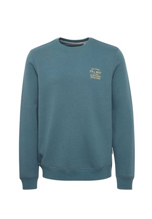 Svijetloplava dukserica od kombinacije pamuka, s okruglim izrezom, dugim rukavima, rebrastim manžetama i malim tiskanim logotipom na prsima.