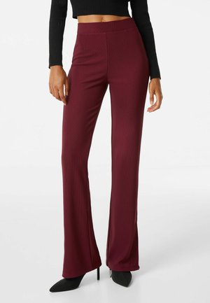 FLARED OTTOMAN - Housut - dark red