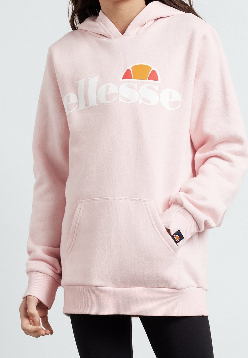 Felpa rosa realizzata in tessuto morbido, con tasca frontale, polsini a costine e una grafica logo colorata. Design classico e sfiancato.