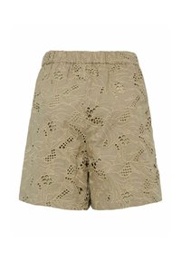 Linstekne shorts i lys beige med et brodert blomsterdesign som har utskårne mønstre og en elastisk midje for komfort.