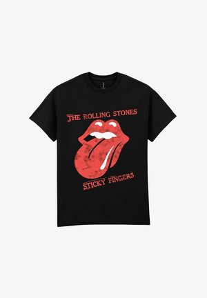 Camiseta de algodón negra con un gráfico del logo de los Rolling Stones en rojo y blanco, con el diseño de la lengua y el texto "Sticky Fingers" debajo.