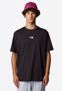 The North Face NEVER STOP - Nyomott mintás póló - tnf black