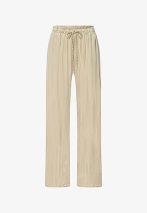 Pantalon beige à jambes larges avec texture côtelée verticale, taille élastique et cordon de serrage avec embouts métalliques.