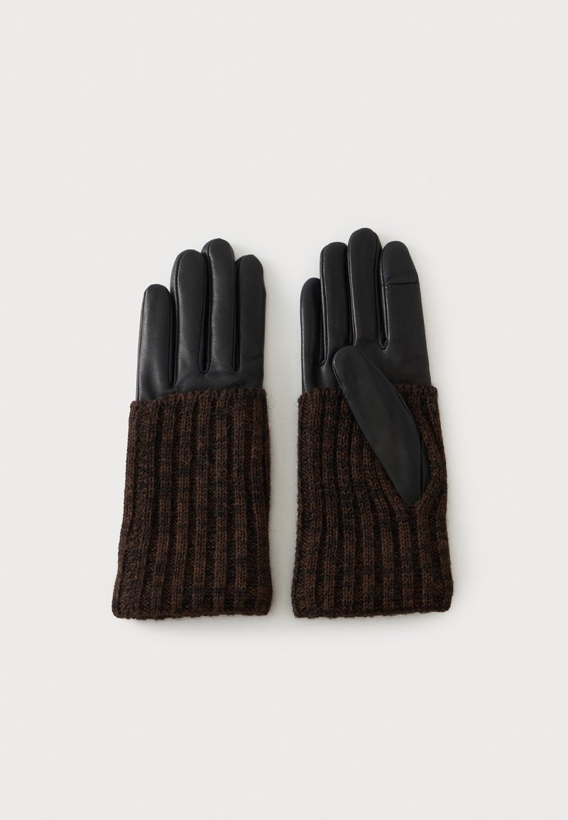 Paire de gants en cuir noir avec poignets en tricot marron foncé, posés à plat sur un fond clair.