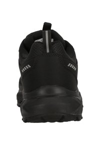 Schwarzer Sportschuh mit einem strukturierten Obermaterial aus Stoff, reflektierenden Akzenten und einer gepolsterten Sohle. Verfügt über einen Zugtab an der Ferse für einfaches Anziehen.