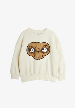 Tejkrémszínű pulóver, barna színű E.T. mesehős arccal nyomtatva. Rugalmas mandzsettákkal és derékrésszel, kör alakú nyakkivágással, puha tapintású.