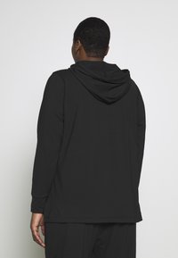 Nike Performance T-Shirt sport - black