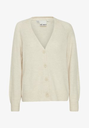 Beige adīta jaka ar V veida kakla izgriezumu, raglanu piedurknēm un četriem priekšējiem pogām. Mīksta tekstūra ar ribotām piedurknēm un apakšu.