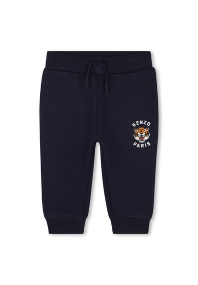 Marineblauwe joggingbroek met elastische tailleband en koord. Bevat een geborduurd tijgerontwerp en de tekst "KENZO PARIS" op het linkerbeen. Zacht materiaal.