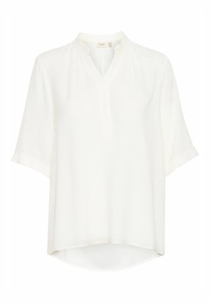 Weiße kurzärmlige Bluse mit V-Ausschnitt, lockerer Passform und strukturiertem Stoff. Der Saum ist hinten etwas länger.