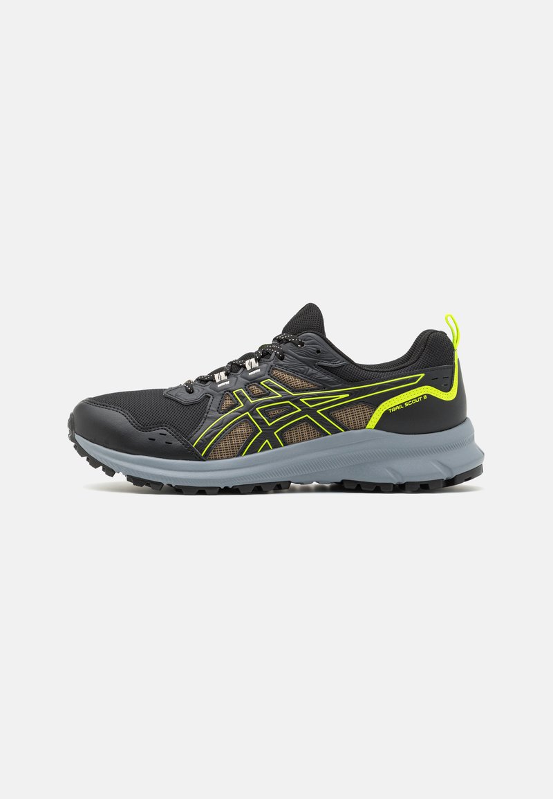Zwarte en grijze trailrunning schoen met neon gele accenten, mesh panelen en een robuuste zool, weergegeven in profiel op een witte achtergrond.