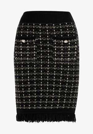 Gonna in tweed nera con motivo in filo dorato, presenta dettagli in perle sulle tasche, una vita a costine e orlo con frange.