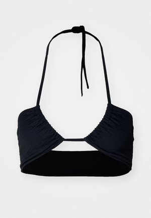 Black bikini top with gathered texture, halter neck ties, and a cut-out detail at the center. Made of lightweight, stretchy material.