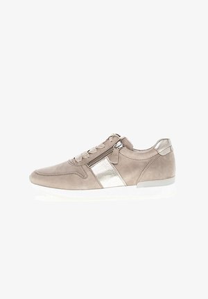 Beige suede sneaker with silver metallic accents, lace-up front, side zipper, and white rubber sole. Sleek design with minimalist style.