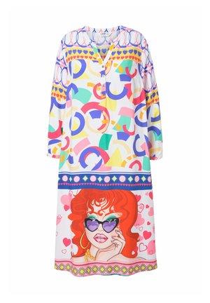 Colorful dress featuring a mix of geometric and heart patterns, with a graphic print of a woman with red hair and heart-shaped sunglasses.