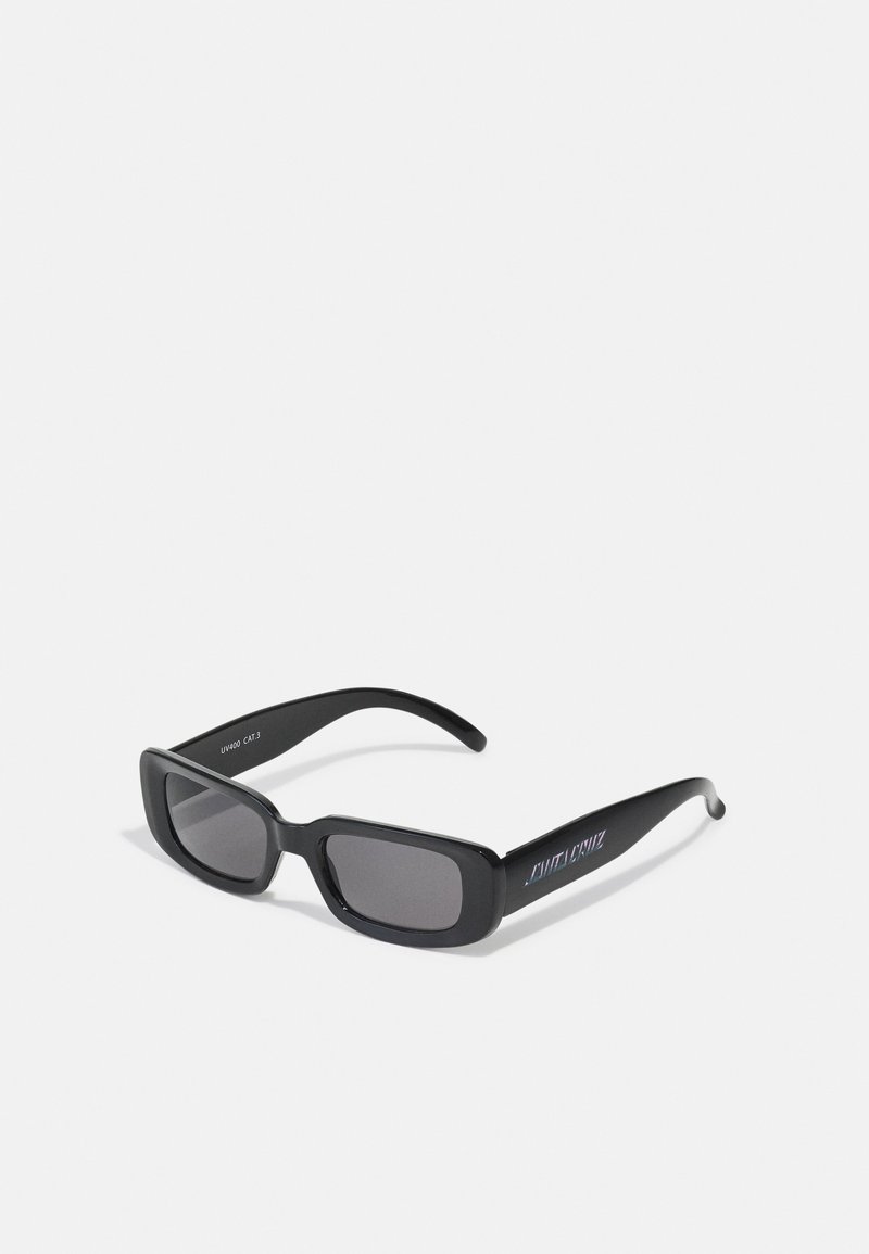 Óculos de sol retangulares pretos com lentes escuras, armações grossas e um acabamento brilhante. Apresenta detalhe de logótipo na haste. Proteção UV400.