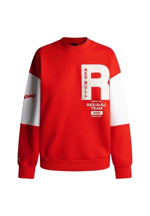Raudona džemperis su baltais akcentais, ryškiu "R" logotipu ir atspausdintu tekstu. Pagamintas iš minkštos medžiagos, turi apvalų kaklą ir guminius rankogalius.