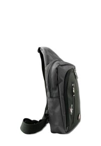 Grijze stoffen schoudertas met een gladde textuur, voorzien van een hoofdvak met rits en een kleiner voorvak met een metalen ritstrekkertje.