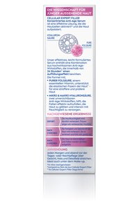 Anti-aging serum box with glossy finish, predominantly white with vibrant purple and pink text. Contains bubbles and a pink dot graphic.